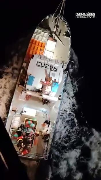 Aerial view of a vessel at sea during the night.