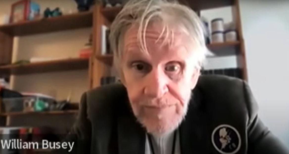 Headshot of William Busey.