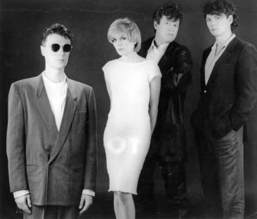 Black and white promotional photo of Talking Heads, circa 1985.