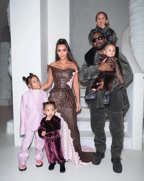 Kim Kardashian and Kanye West with their four children, North, Saint, Chicago, and Psalm West.