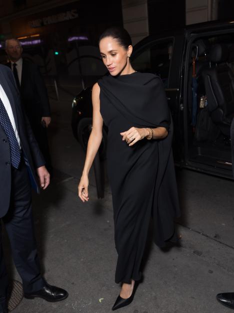 Meghan Markle in a black dress attending the Balenciaga Womenswear Spring/Summer 2026 show.