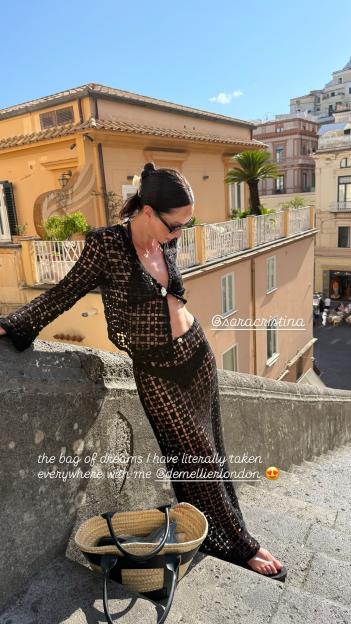 Woman in black crochet outfit on a honeymoon.