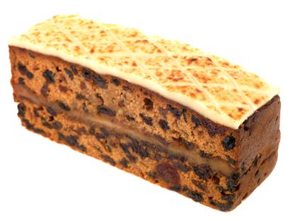 Simnel cake slice with marzipan topping.