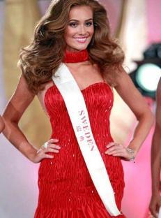 Nicoline Artursson, Miss Sweden, in a red dress.