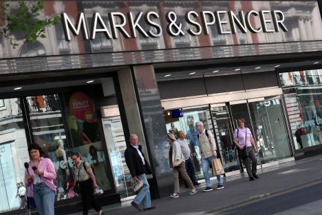 Pedestrians outside a Marks & Spencer store in London.