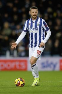 John Swift of West Bromwich Albion with the ball during a soccer match.