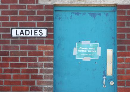 Closed women's restroom due to coronavirus.