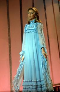 Olivia Newton-John singing at the Eurovision Song Contest.