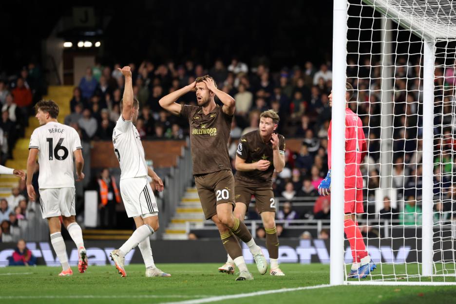 Kristoffer Ajer of Brentford reacts following a missed chance during a Premier League match.