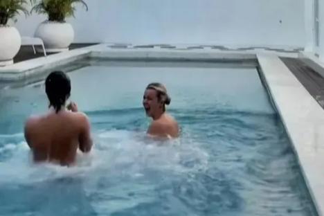 Moment skinny dipping pals dive naked into pool they thought was their private sanctuary – before making shock discovery