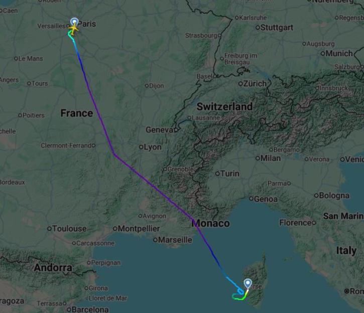 Flight tracker map showing a flight from Paris making circles over Corsica.