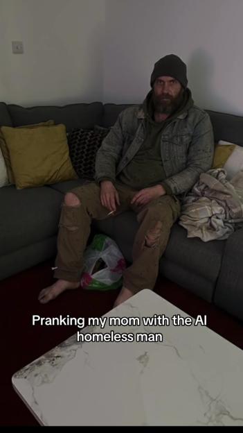 A man dressed in tattered clothing and a beanie sits on a sofa next to a plastic bag. Text overlay reads, "Pranking my mom with the AI homeless man."