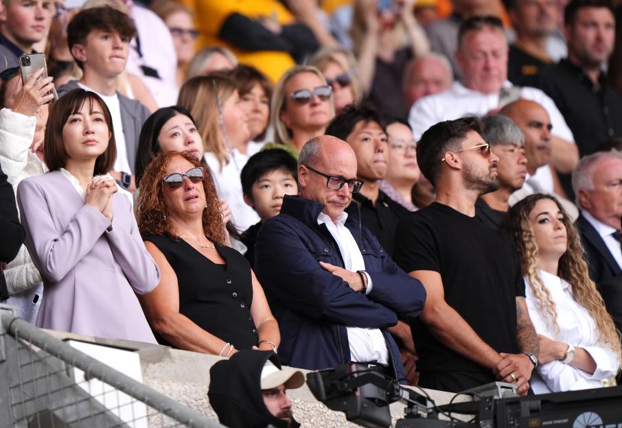 Parents of Diogo Jota and Andre Silva at a Premier League match.