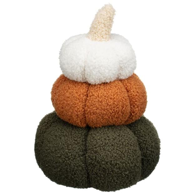 Stack of three plush pumpkins in white, orange, and green.
