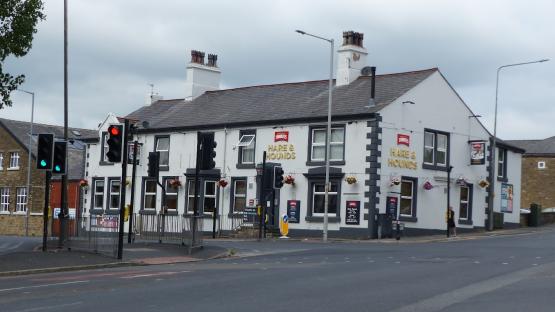 The Hare & Hounds pub at a crossroads.