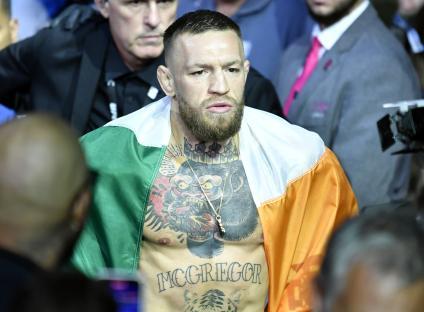 Conor McGregor draped in the Irish flag before a UFC fight.