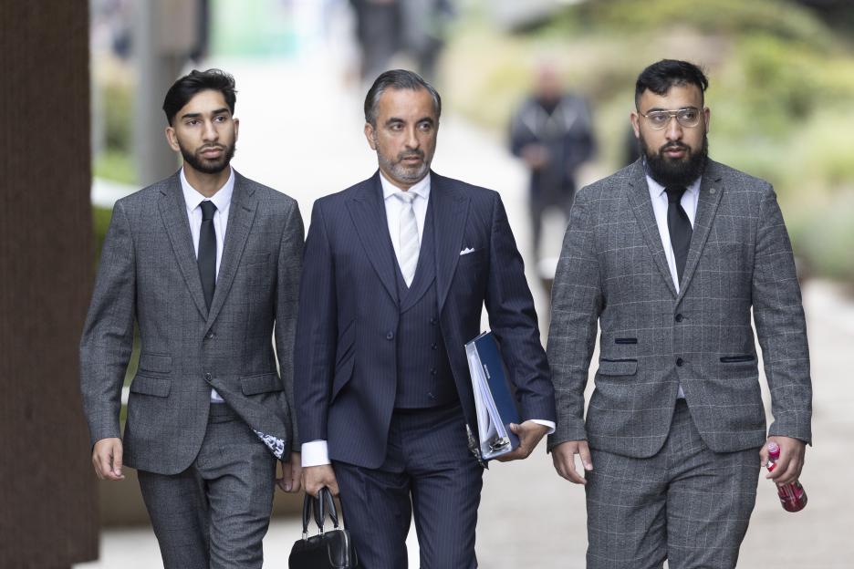 Two brothers arrive at Liverpool Crown Court for their trial.
