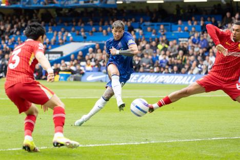 Enzo FernÃ¡ndez of Chelsea scoring a goal against Liverpool.