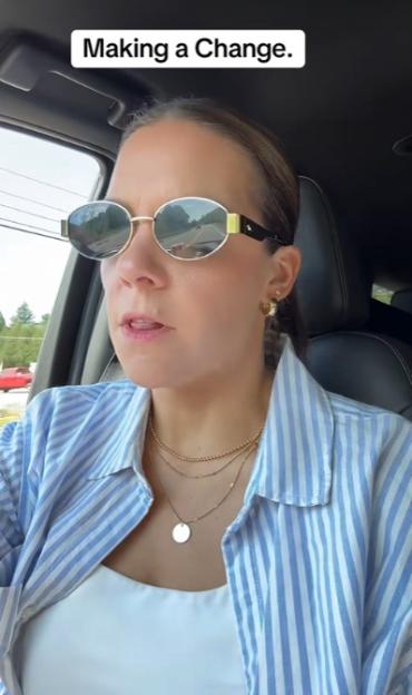 Woman in a car talking about making a change.