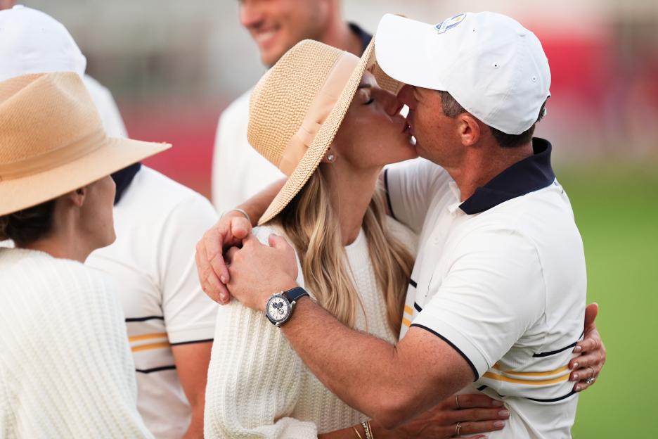 Rory McIlroy kisses his wife Erica Stoll.