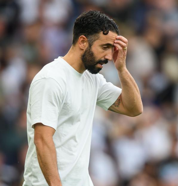 Manchester United manager Ruben Amorim looking distressed.
