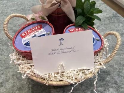 Gift basket with ice cream and a note from the Duchess of Sussex.
