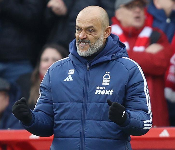 Nuno Espirito Santo, manager of Nottingham Forest, celebrates by punching the air.