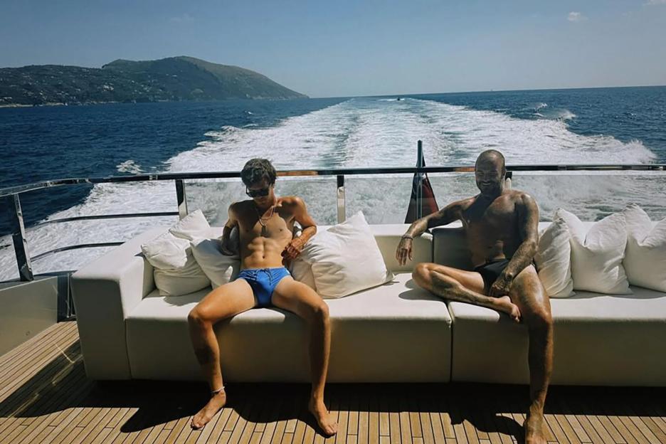 Cruz Beckham, 20, and dad David, 50, send fans wild as they both pose in speedos on family yacht holiday