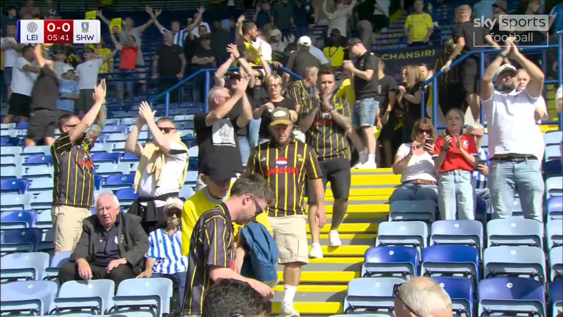 Leicester City fans applaud Sheffield Wednesday supporters.