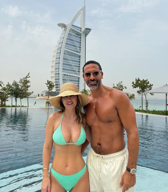 Couple by a pool in Dubai.