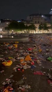Litter and trash covering Trafalgar Square after a Sunderland fans' celebration.