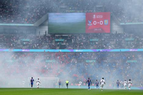 Crystal Palace fans earn club an FA charge within 30 SECONDS after engulfing Wembley in smoke by sneaking in flares