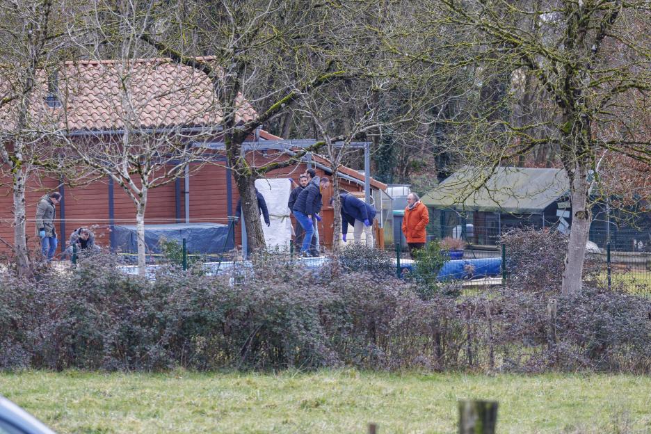 Investigators at a crime scene.