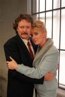 Photo of Liz McDonald and Jim McDonald embracing.