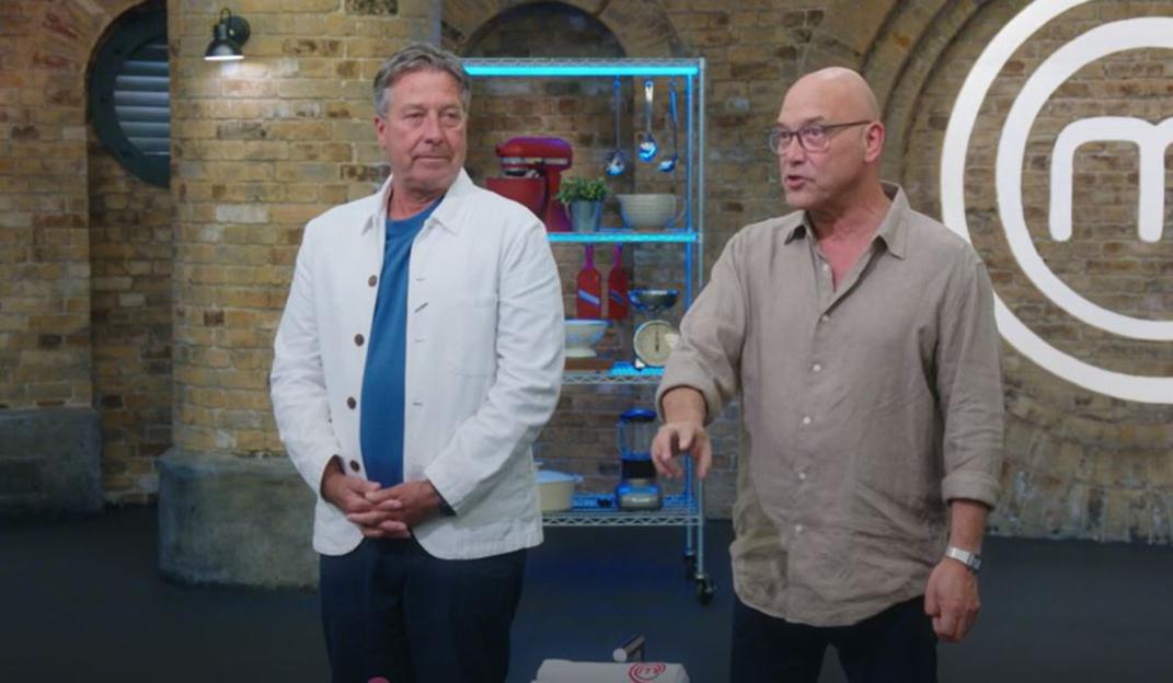 Two Masterchef judges in the Masterchef kitchen.