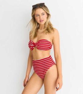Woman in red and white striped bikini.