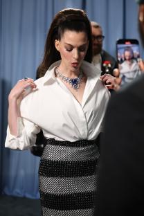 Aimee Lou Wood at the Met Gala wearing a black tuxedo dress.
