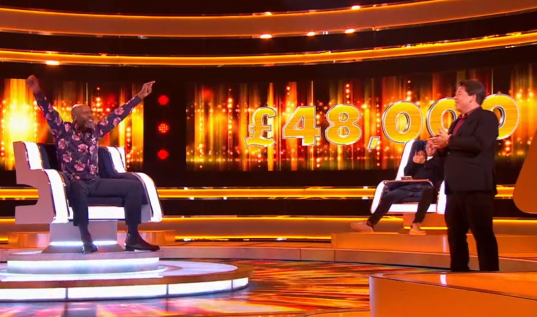 Game show contestant celebrating a £48,000 win.