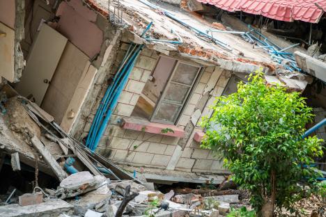 Damaged residential building in Naypyidaw, Myanmar after an earthquake.
