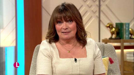 Lorraine Kelly discussing the Change + Check choir's performance at Buckingham Palace.
