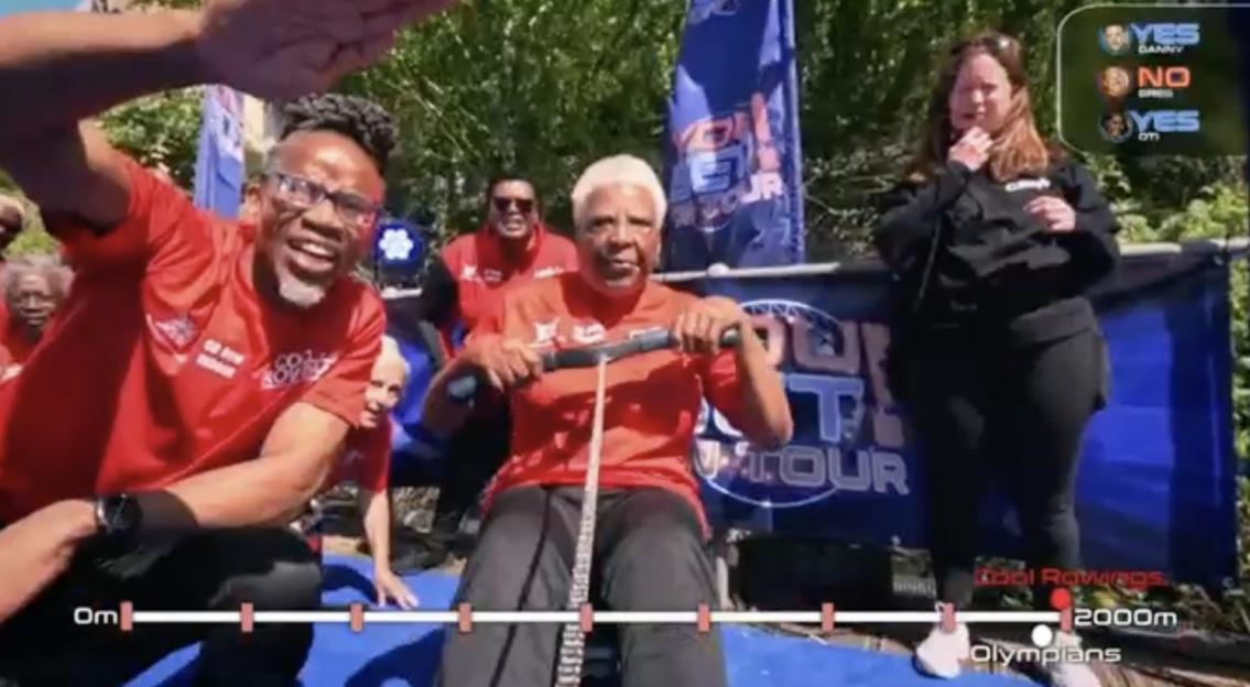 Screenshot from ITV's You Bet on Tour showing a rowing race.