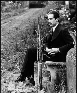 Black and white photo of Robert De Niro in The Godfather Part II.