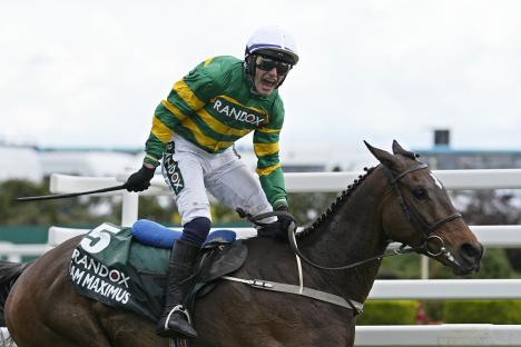 Jockey P. Townend winning the Randox Grand National on I Am Maximus.