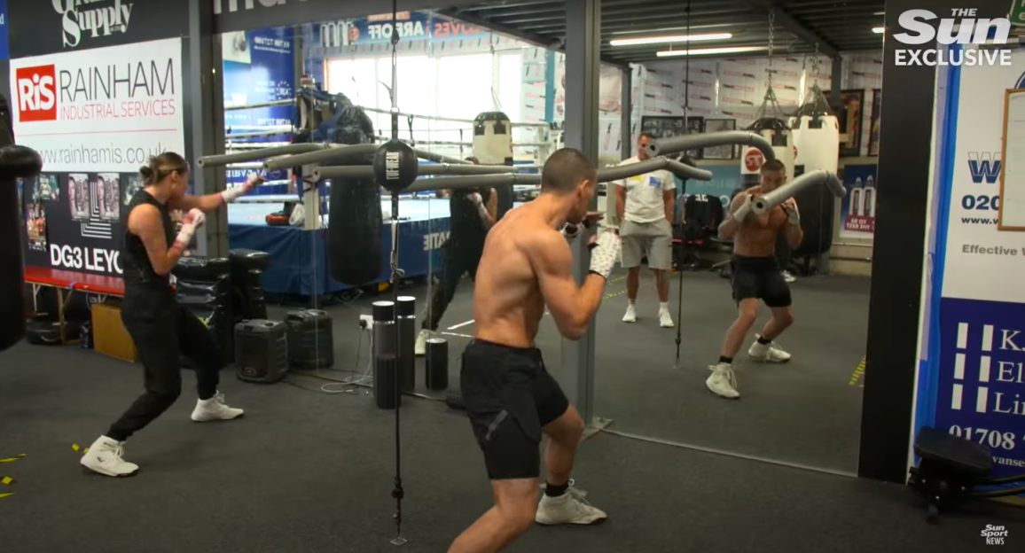 Boxers training in a gym.
