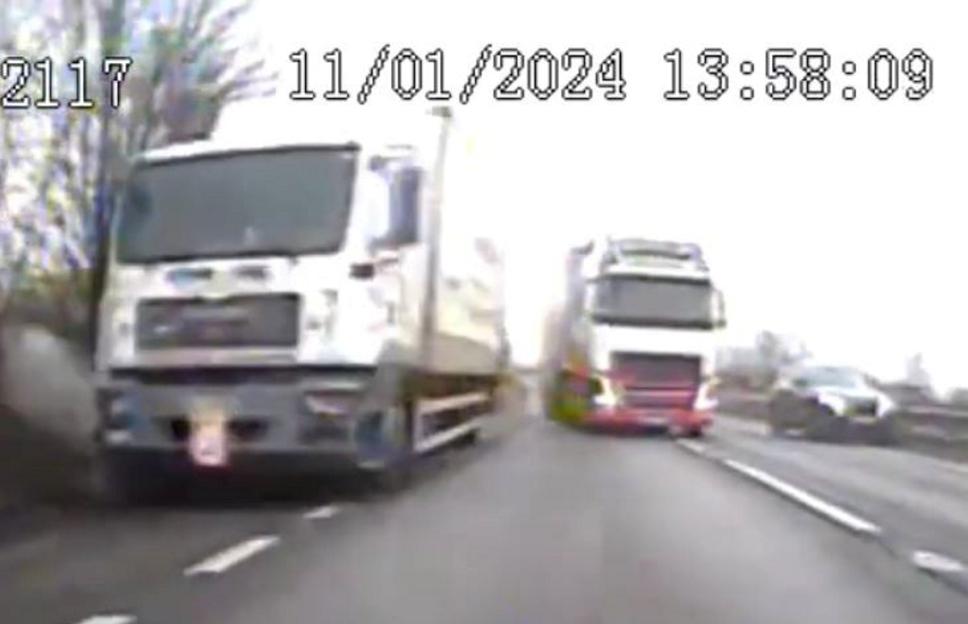 Dashcam footage of a lorry ploughing into cars in a layby.