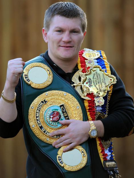 Ricky Hatton with his boxing championship belts.