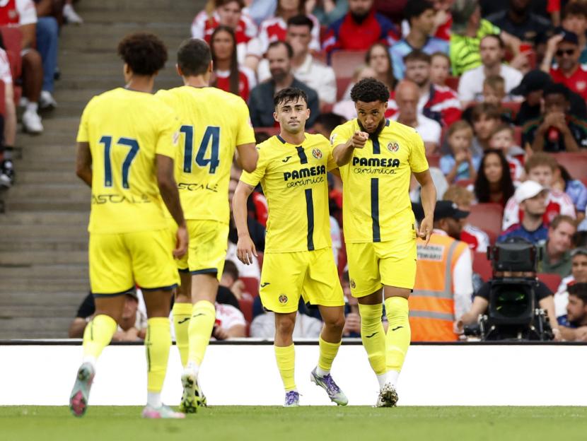 Villarreal's Arnaut Danjuma celebrates a goal with teammates.
