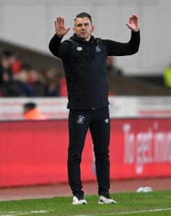 Luton manager Matt Bloomfield at a soccer match.