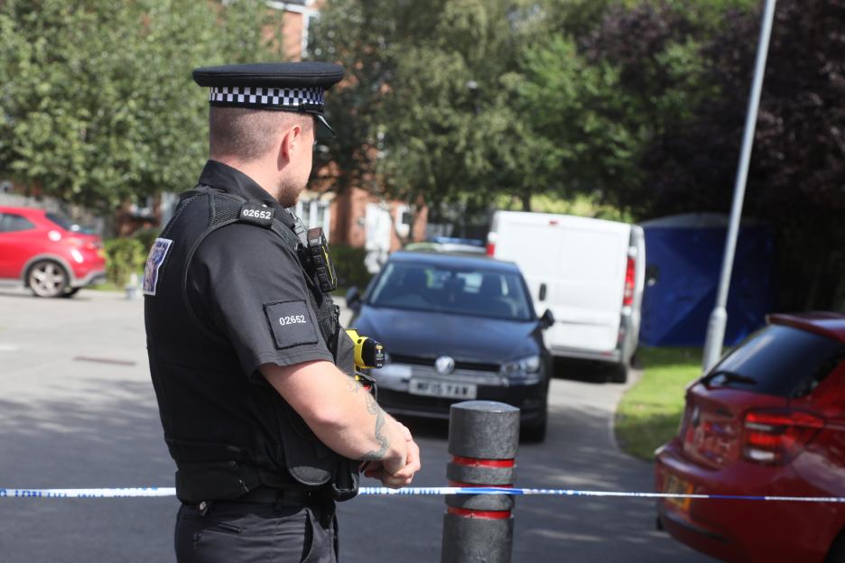 Police officer at a crime scene.