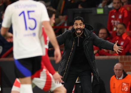 Manchester United manager Ruben Amorim reacting during a soccer match.